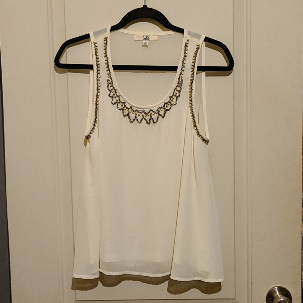 Irony swing tank with beading.